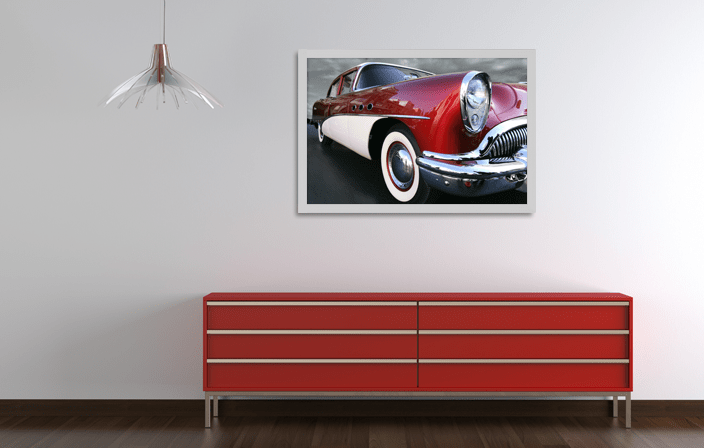 Aluminium Gallery Frame Industrial AD30 in silver matt colour, with picture of an old timer car, placed in interior with red cupboard. Picture frame producer Debex Suisse aG.