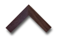 Corner sample of a dark walnut wood picture frame molding on a black background