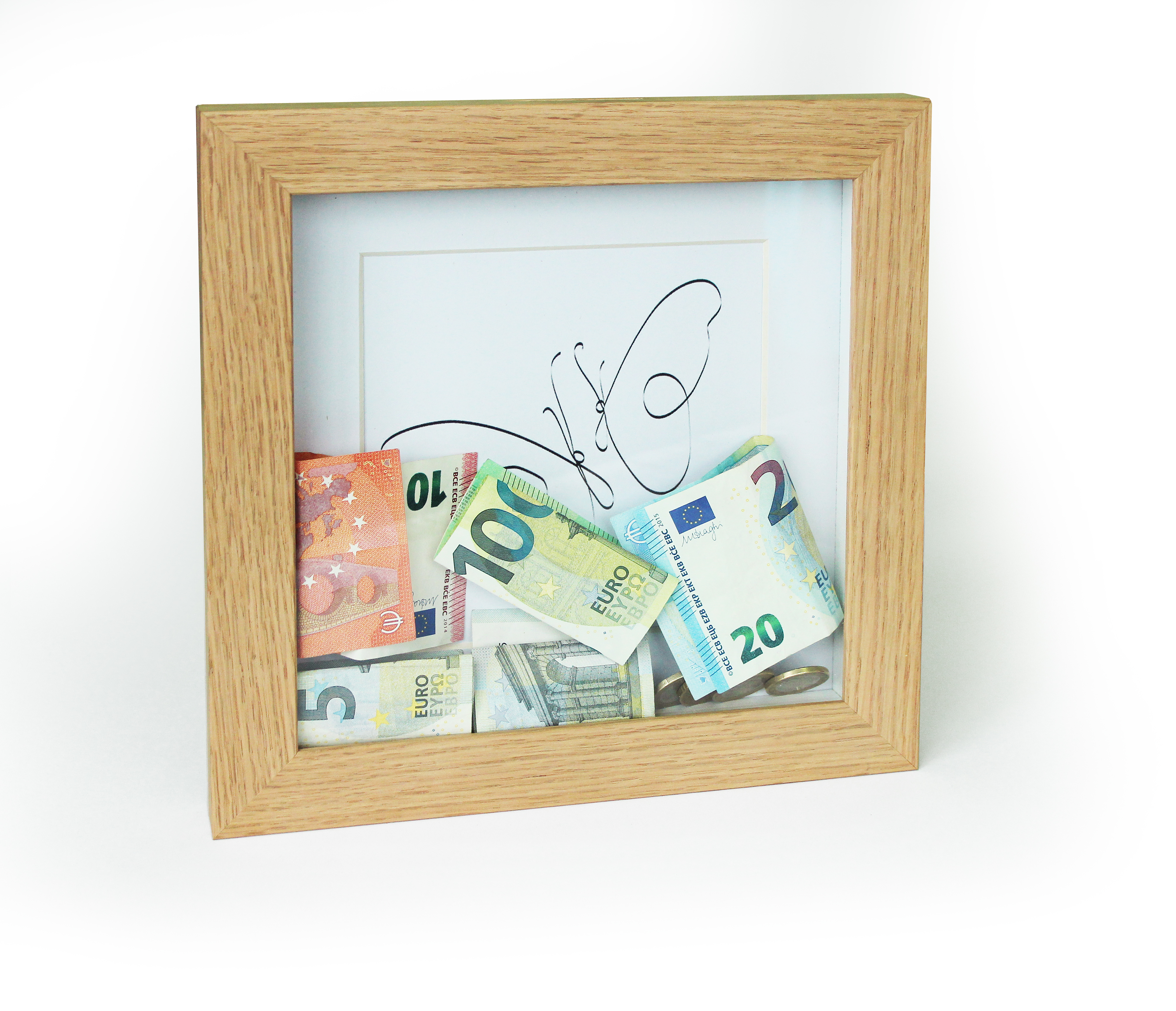 Oak wood frame made as money box, with 3D effect and slot for coins, banknotes, or messages. Picture frame producer Debex Suisse.